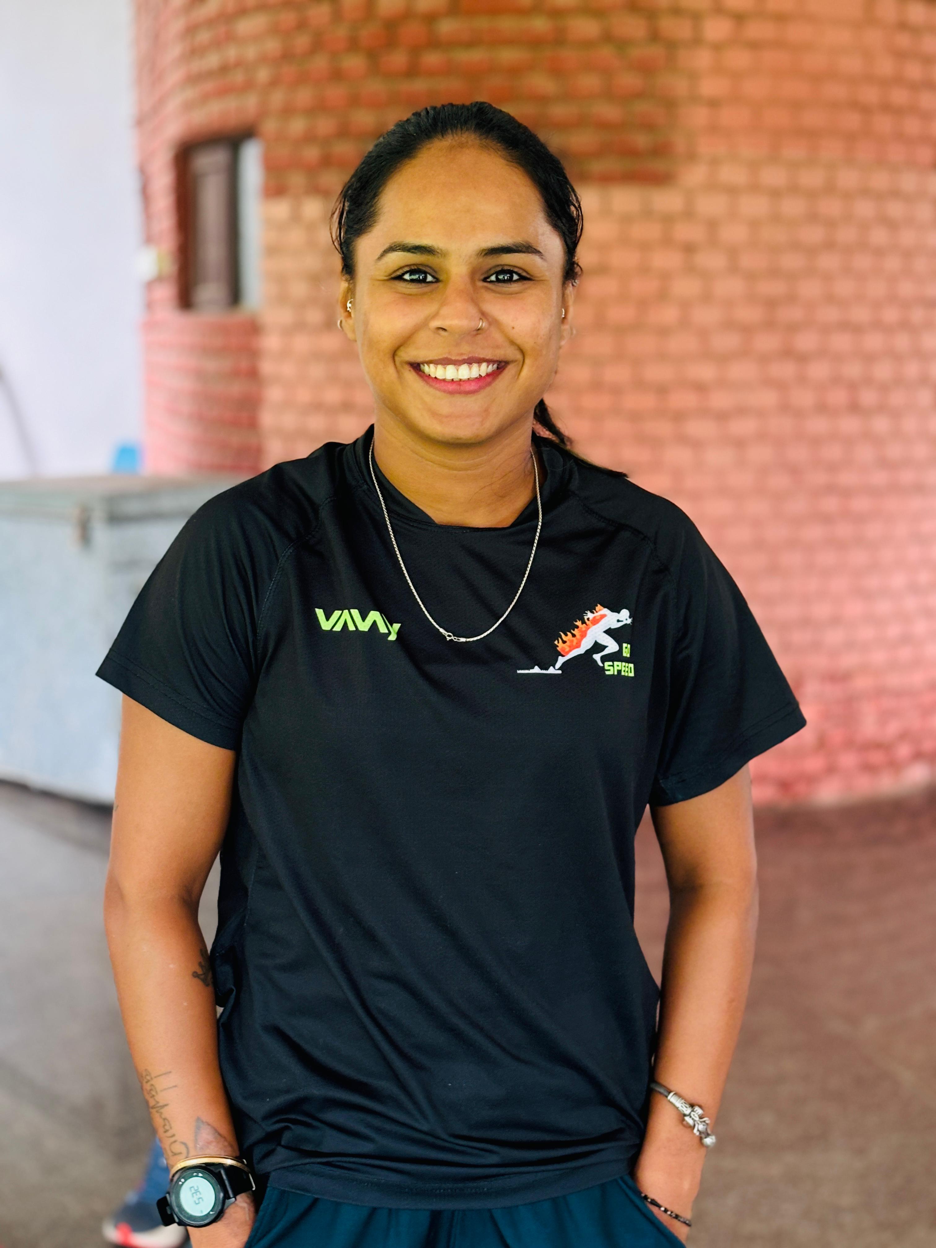 Coach Simran, Fastest Girl of Delhi, sprint and hurdles specialist demonstrating athletic form